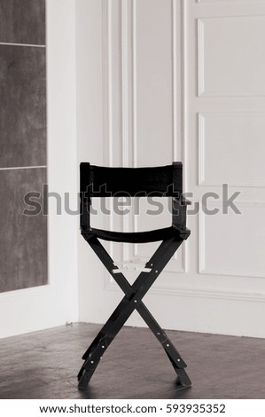 black folding chair indoor