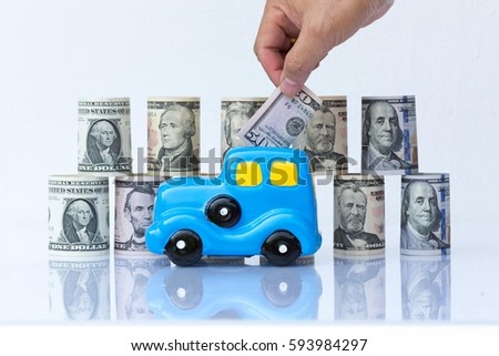 Business concept, car model bank in front of money background