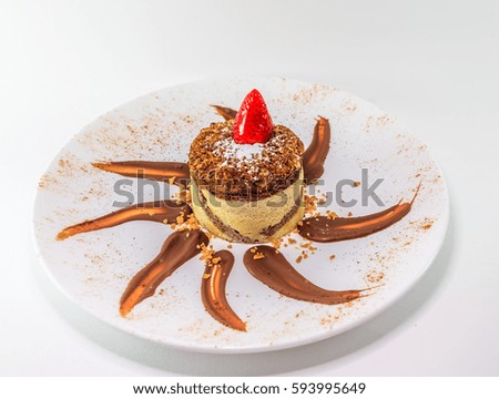 Chocolate and hazelnuts mousse with a strawberry on top