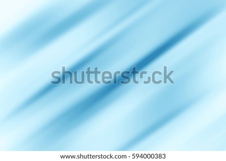 Abstract background with blue lines at an angle of 45 degrees on a white background with motion blur effect