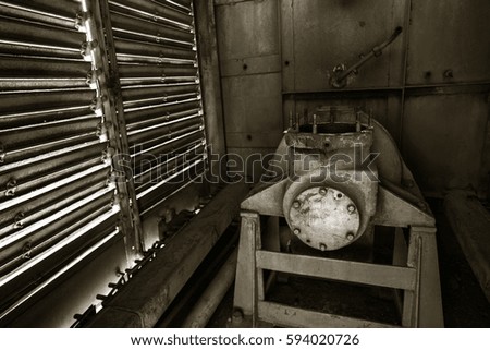 Old rusty train locomotive thrown Exclusion zone of Chernobyl. Zone of high radioactivity. Ghost town Pripyat. Chernobyl disaster. Rusty abandoned Soviet machinery in area of nuclear accident at plant