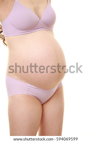 pregnant woman wearing purple underwear