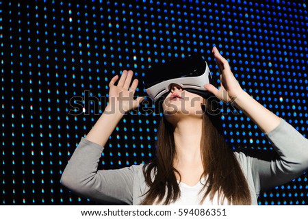 Young Woman Wear Virtual Reality Digital Glasses