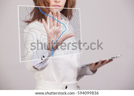 Geographic information systems concept, woman scientist working with futuristic GIS interface on a transparent screen. Royalty-Free Stock Photo #594099836