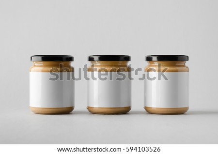 Peanut / Almond / Nut Butter Jar Mock-Up - Three Jars. Blank Label Royalty-Free Stock Photo #594103526