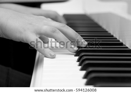 Close-up piano, white and black keyboard