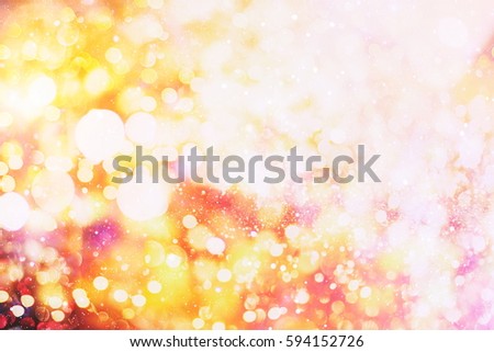 abstract blurred and silver glittering shine bulbs lights background:blur of Christmas wallpaper decorations concept.holiday festival backdrop:sparkle circle lit celebrations display.