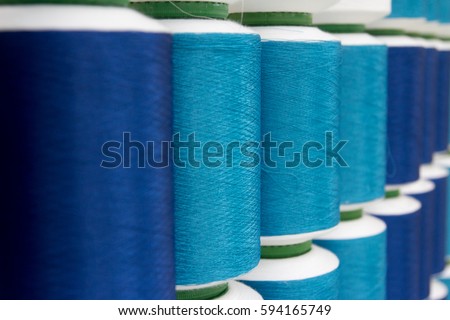 Closed up of various blue color thread reel background