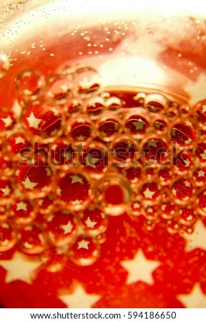 Red bubbles on stars background. 