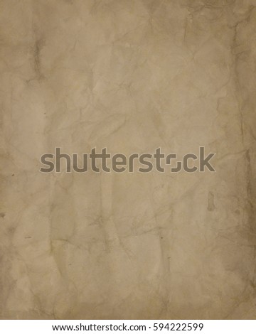 old brown paper background in light tan color, wrinkled and creased texture in old distressed vintage design