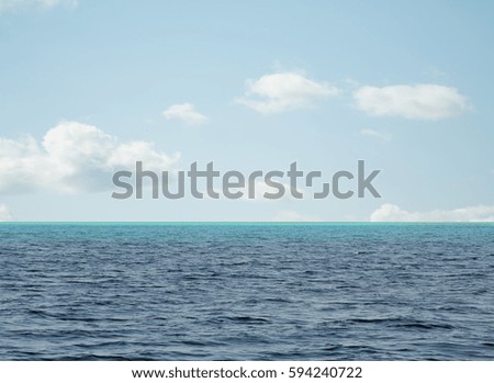blue sky with clouds and sea