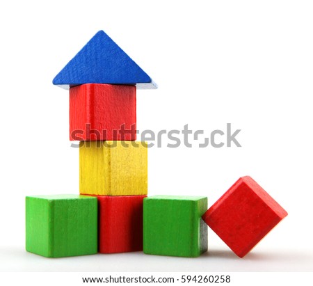 Wooden building blocks isolated on white background. Royalty-Free Stock Photo #594260258