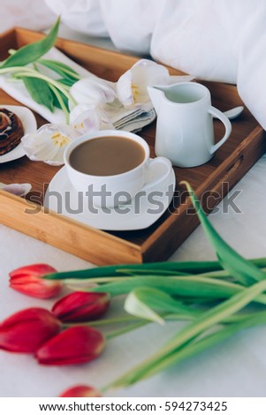 Breakfast in bed with coffee