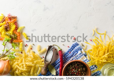 Bright picture with different varieties of pasta and Lasha. Spices and seasonings for cooking. Plenty of space for text.