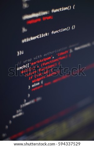 Programming code on computer screen. Software development. Writing program code on computer.