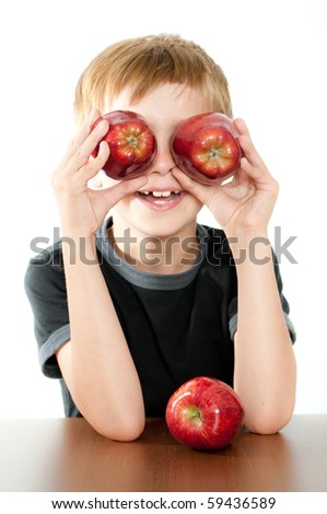 Happy Boy Holding Delicious Red Apples