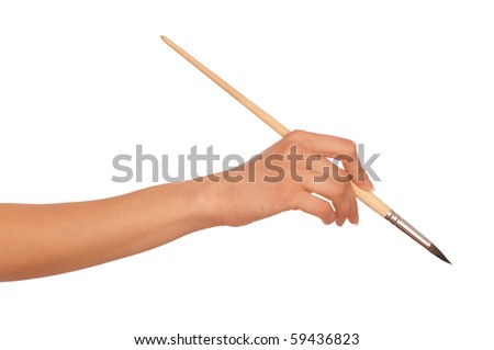 woman drawing a picture with a brush