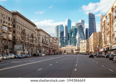 Landscape of Moscow architecture combining modern and old city, Russia. Outdoor modern Moscow city skyscrapers. Travel Russia and explore architecture landmarks of Moscow business center. Urban Moscow Royalty-Free Stock Photo #594386669