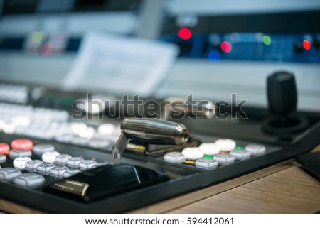 Blurring background. control buttons and lever switch on the control panel television