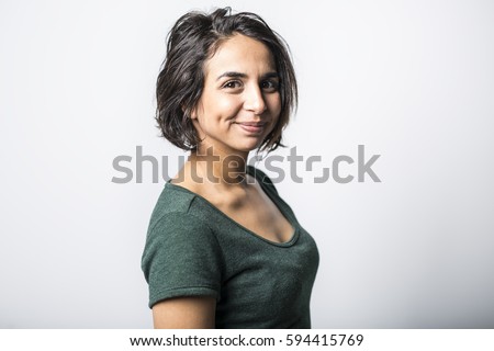 A bright brunette girl isolated on a white background
