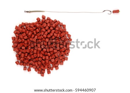 Fishing bait with hook and red pre-drilled halibut pellets for carp fishing isolated on white background with soft shadow