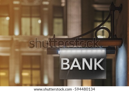Bank sign and classic buildings - finance concept
