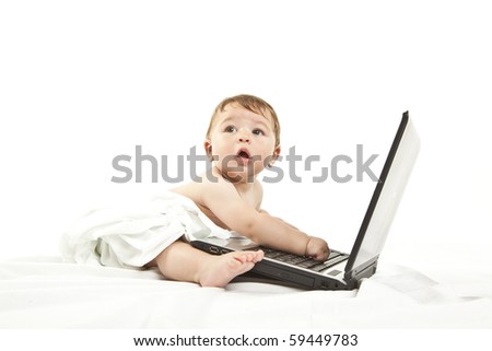 cute little baby using a pc