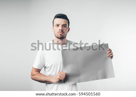 isolated on white background man holds a poster bearded