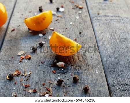 spices, salt, cherry, tomatoes, mangold on a wooden table
