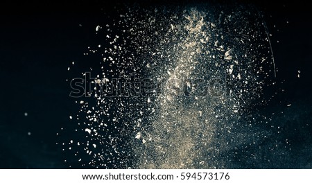 Powder explosion on black background. Colored cloud.  Colorful dust explode. Paint Holi.