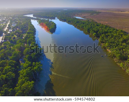 Aerial view of Murray Darling Junction with flood waters flowing in near Lock 10. Location Wentworth
 Royalty-Free Stock Photo #594574802