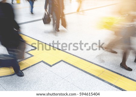 people walking in the street, (blur focus)