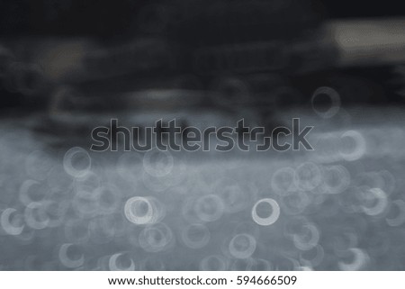 The reflection in the river./reflection,black,write,water sparkling,sparks,blur,circle,booked