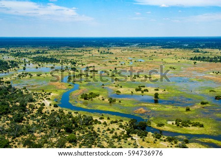 The Okavango Delta, Botswana Royalty-Free Stock Photo #594736976