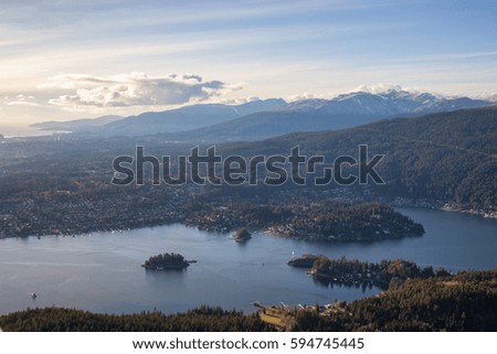 Aerial view on Deep Cove and North Vancouver, British Columbia, Canada. Picture taken during a cloudy winter day.