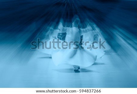 Whirling Dervish sufi religious dance Royalty-Free Stock Photo #594837266