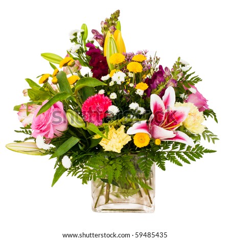 Colorful flower bouquet arrangement centerpiece in vase isolated on white.