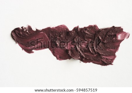Background smear lipstick on a white background
