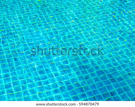 Swimming pool clear blue water.