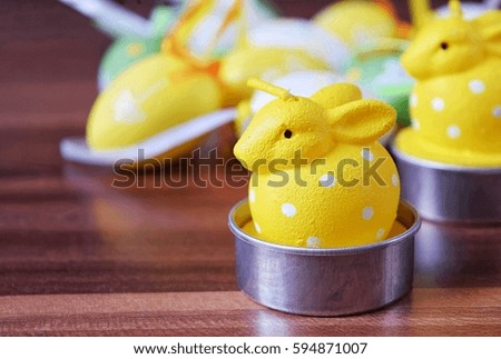 yellow rabbit  on table 