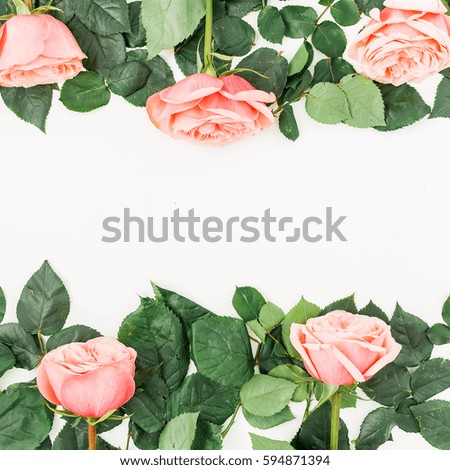 Floral frame pattern with roses and leaves isolated on white background. Flat lay, top view