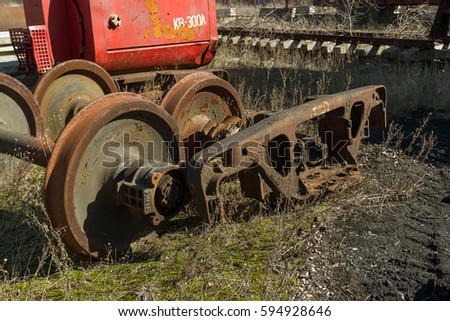 Old rusty locomotive was sent to restricted area of ??Chernobyl. Zone of high radioactivity. Chernobyl disaster. Rusty emblem and stigma of the Soviet Union. Sign, symbol disappeared in 1992 of USSR