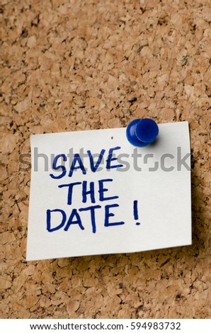 Save the date message on sticker note pin on cork office board. Reminder for registration or appointment written on card. Business concept.