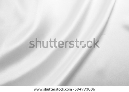 abstract background luxury cloth or liquid wave or wavy folds Royalty-Free Stock Photo #594993086