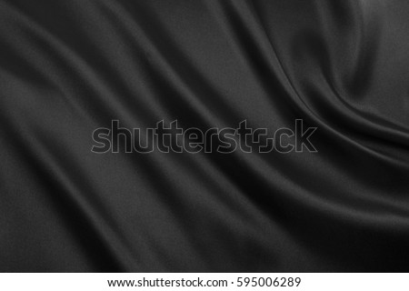 abstract background luxury cloth or liquid wave or wavy folds Royalty-Free Stock Photo #595006289