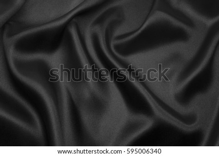 abstract background luxury cloth or liquid wave or wavy folds Royalty-Free Stock Photo #595006340