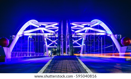 A view of Highway 59 Bridge lights on in Houston, Texas, USA Royalty-Free Stock Photo #595040816
