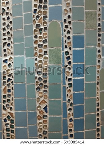 View of colorful tiles with bluish background 