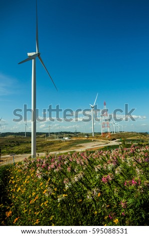 Image of wind turbine for produce wind energy with blue sky
