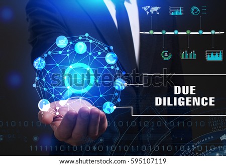 Business, Technology, Internet and network concept. Young businessman working on a virtual screen of the future and sees the inscription: Due diligence

